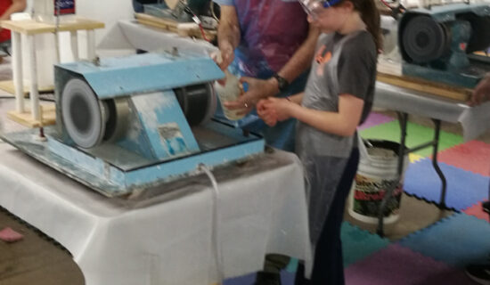 homeschool learner and geologist use machinery