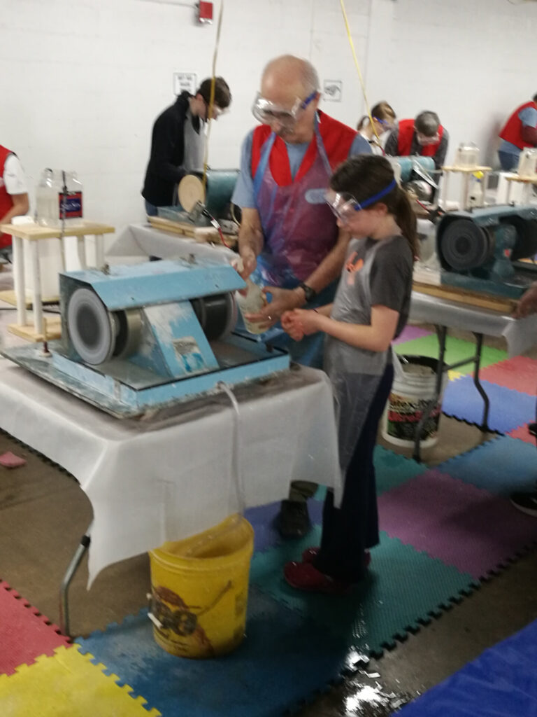 homeschool learner and geologist use machinery